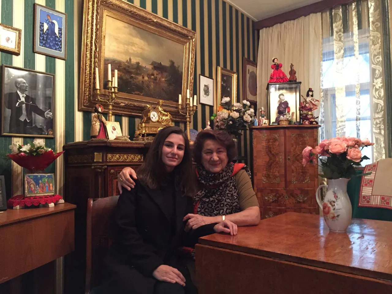 Tatev Muradyan sitting next to her violin teacher, Lia Grigoryevna Melik-Muradyan.