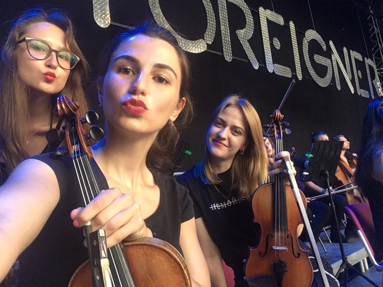 Tatev Muradyan on stage before a Foreigner rock band concert in Gelsenkirchen, Germany.